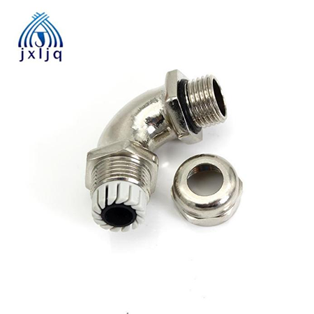 Brass conduit fitting threaded to a distribution box